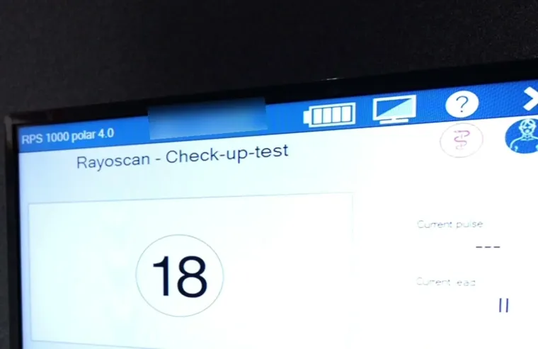 Non-invasive body scan measurement during a check-up at Quora Medical Wellness